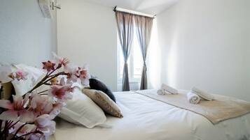 1 chambre, fer et planche à repasser, Wi-Fi gratuit, draps fournis