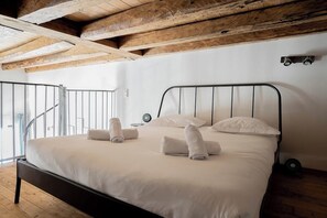 Fer et planche à repasser, draps fournis