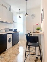 40-inch flat-screen TV with digital channels, TV