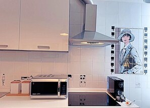 40-inch flat-screen TV with digital channels, TV