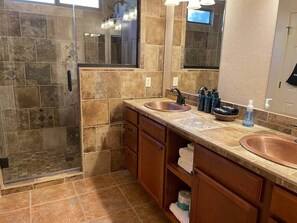 Shower, hair dryer, towels, soap