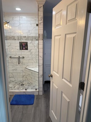 Shower, hair dryer, towels, soap