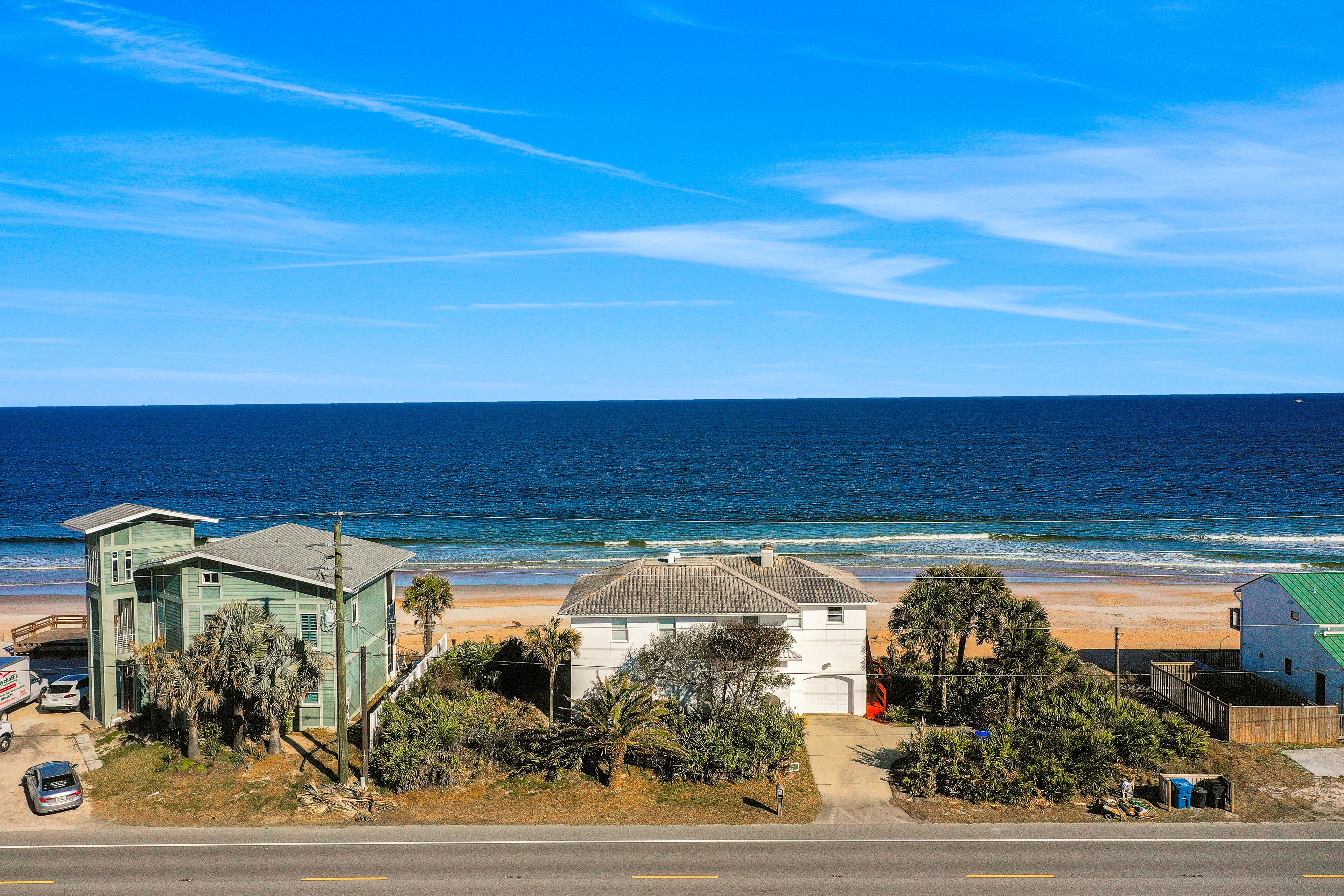 Oceanfront, dog-friendly home with beach access, large deck & sunrise views