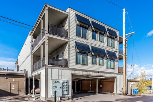 Downtown, mountain-view stay with balcony, fireplace & washer/dryer
