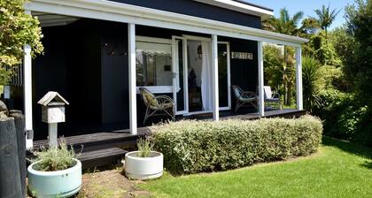 Rosie's cottage in Stanmore Bay , a short walk to beach with a great seaview.