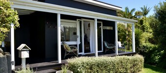 Rosie's cottage in Stanmore Bay , a short walk to beach with a great seaview.