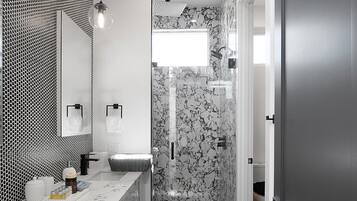 Shower, hair dryer, towels, soap