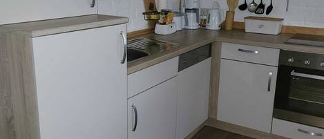 Refrigerador, horno, placa de cocina, lavavajillas