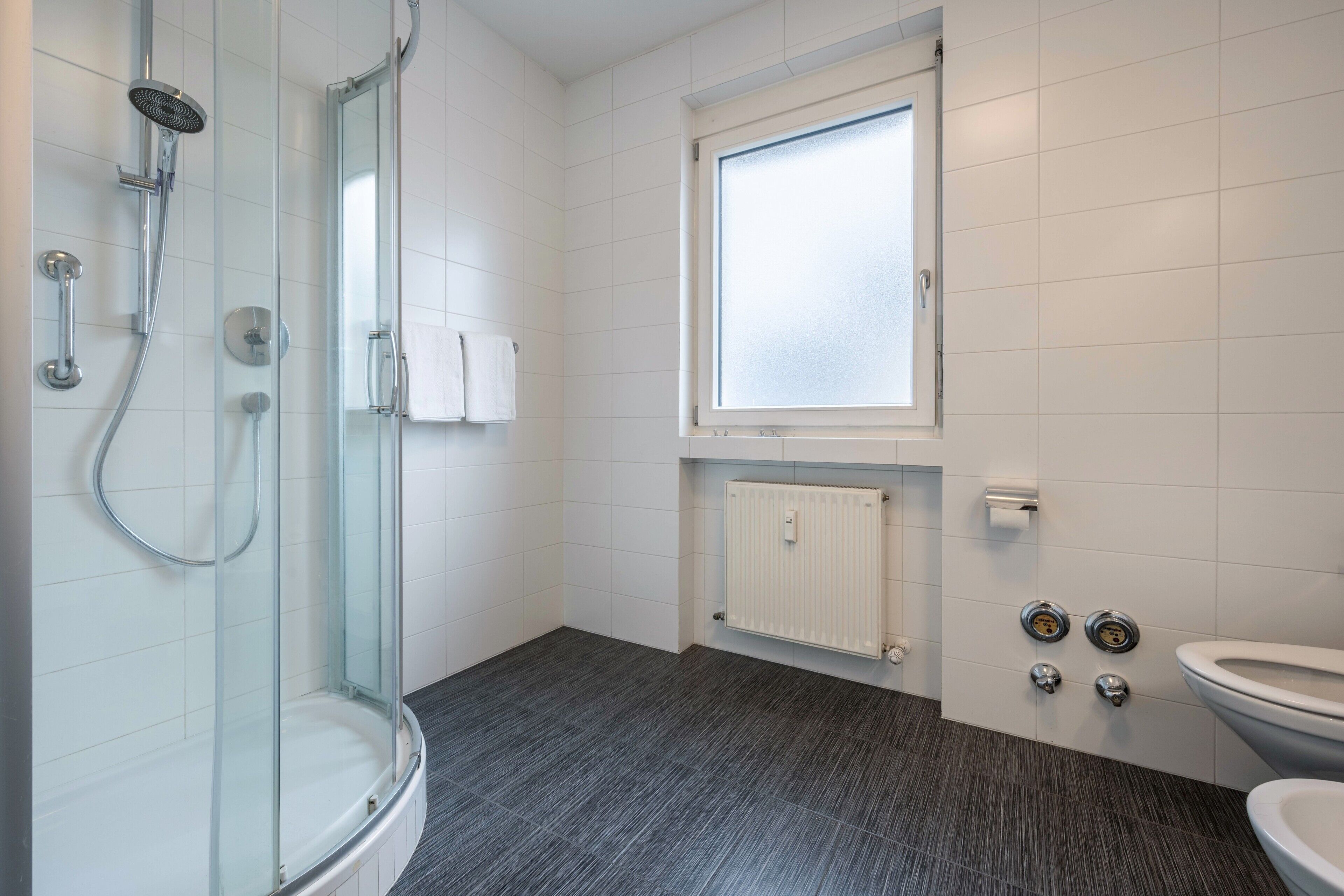 Shower, free toiletries, hair dryer, towels