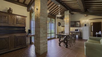 Honeymoon Apartment | Living area | 30-inch TV with cable channels