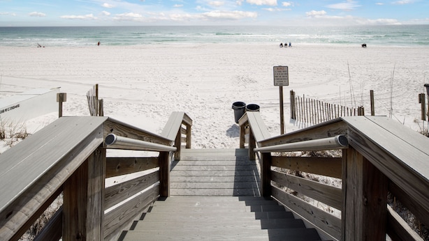 A wooden staircase leading to a sandy beach with a clear sky. - BR 108: Golden Horizon - Indulge in the Ultimate Beachfront Escape! 2nd level (Fort Walton Beach)
