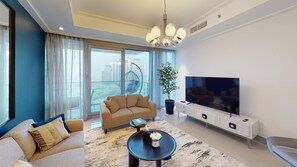 Family Apartment | Living area | 55-inch Smart TV with cable channels, TV - SuperHost - Family-Size Apartment With Full Burj Khalifa View (Dubai)