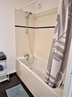 Shower, eco-friendly toiletries, hair dryer, towels