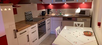 Romatic apartment in the countryside with loggia, sauna area, garden, pond, horses