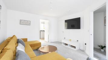 House | Living area | 55-inch Smart TV with digital channels, TV