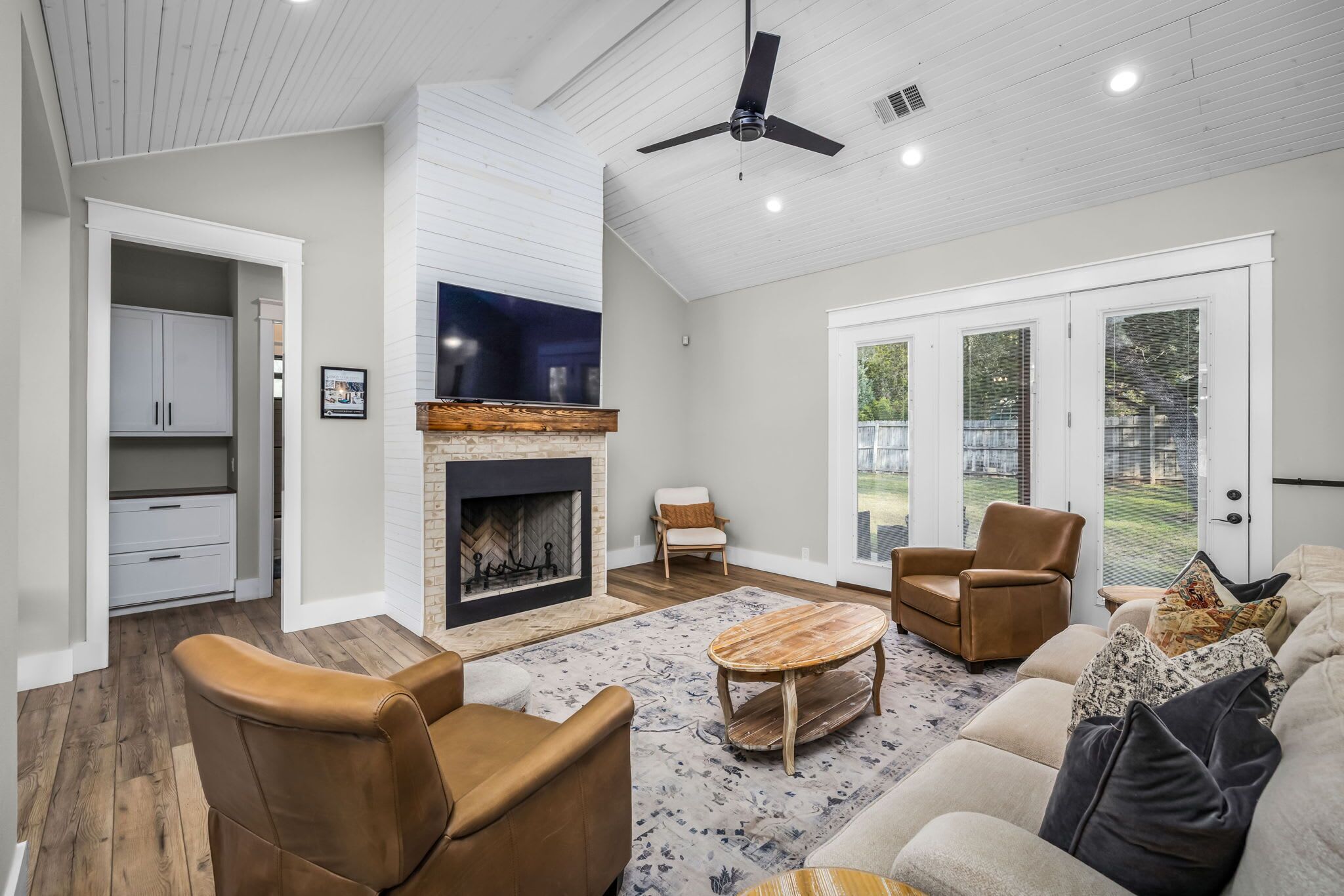 TV, fireplace, books, offices