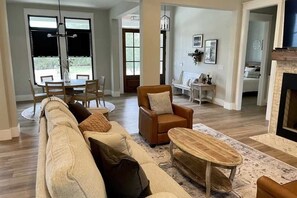 TV, fireplace, books, offices