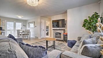 TV, fireplace, books