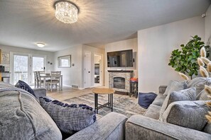 TV, fireplace, books
