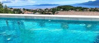 Exclusive vacation apartment near Opatija with 180° sea view and private pool.