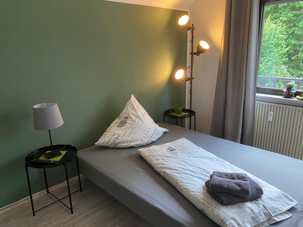 3 bedrooms, desk, iron/ironing board, travel cot