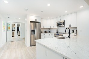 Microwave, dishwasher, coffee/tea maker, toaster