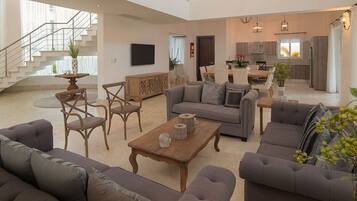 Luxury Villa, 6 Bedrooms | Living area | 40-inch TV with satellite channels