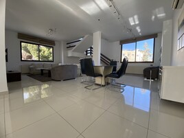 Premium Apartment | Living area | 42-inch Smart TV with digital channels, TV, Netflix