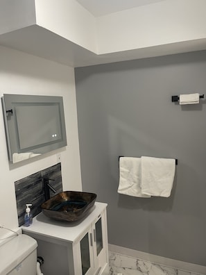 Hair dryer, towels, soap, shampoo