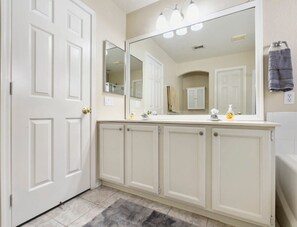Bathtub, hair dryer, towels
