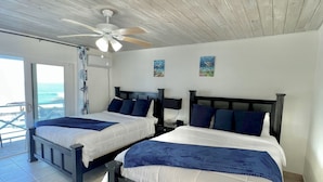 Dobbeltrom – standard, 2 queensize-senger, havutsikt, ved strandkanten | Minibar, safe på rommet, lydisolert og strykejern/-brett