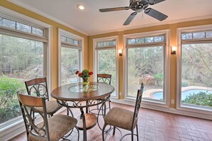 Enjoy meals in this dining area with a round table and six comfortable chairs.