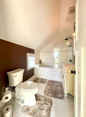 Shower, towels, toilet paper