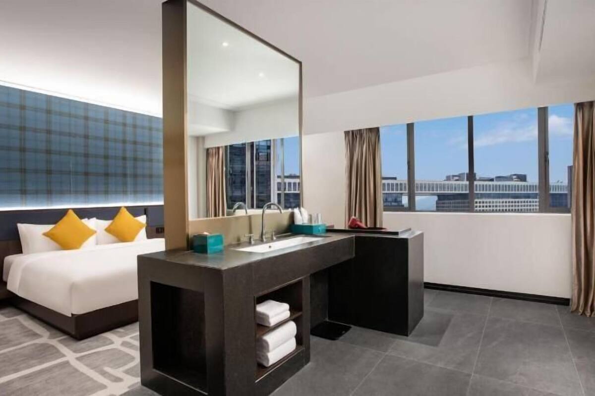 Premium bedding, down comforters, pillowtop beds, free minibar