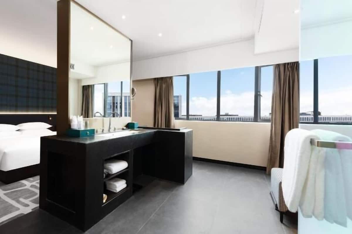 Premium bedding, down comforters, pillowtop beds, free minibar