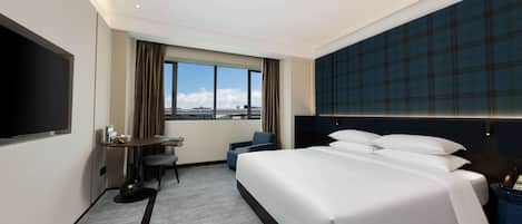 Luxe beddengoed, donsdekens, pillowtop-bedden, een gratis minibar