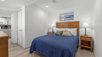 Junior Single Room, 1 Queen Bed, Kitchenette, Ground Floor | In-room safe, desk, laptop workspace, iron/ironing board