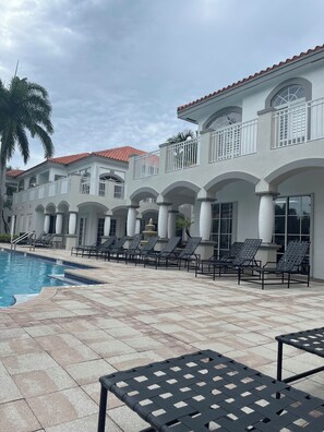 Outdoor pool, a heated pool -  Resort Style Vacation Condo with keyless entry (Palm Beach Gardens)