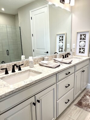 Shower, towels, soap, toilet paper - Five star accommodations designer finishes in luxurious furnishings. (Sarasota)