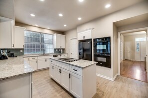 Fridge, microwave, oven, stovetop - Texas Size 5Bed 3.5Bath, Heated Spa, Pool (Plano)