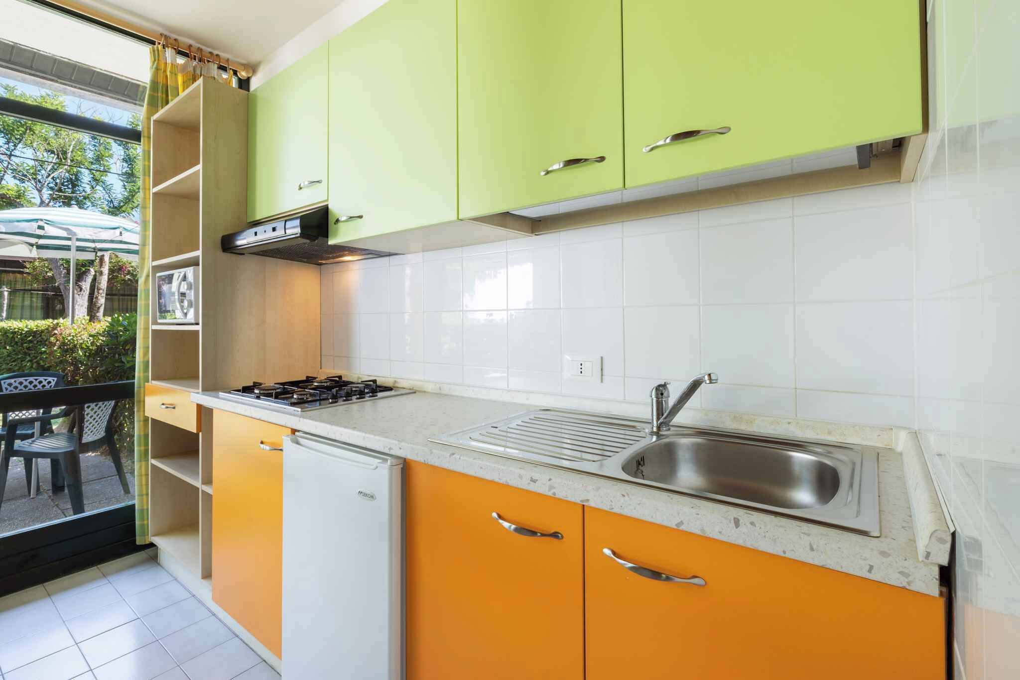 Frigorifero, microonde, piano cottura, macchina per tè/caffè