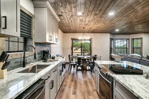 Fridge, microwave, oven, stovetop - Luxury Cabin 1 Mile to Dollywood | Private Pool Spa, Theater & Arcade (Sevierville)