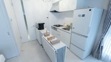 Fridge, microwave, stovetop, cookware/dishes/utensils