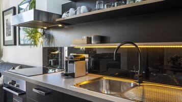 Coffee/tea maker, fridge, microwave, oven