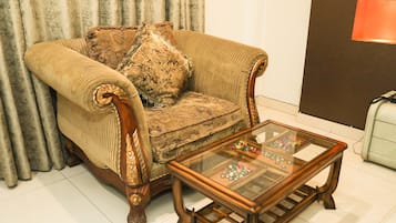 32-inch flat-screen TV with cable channels, TV