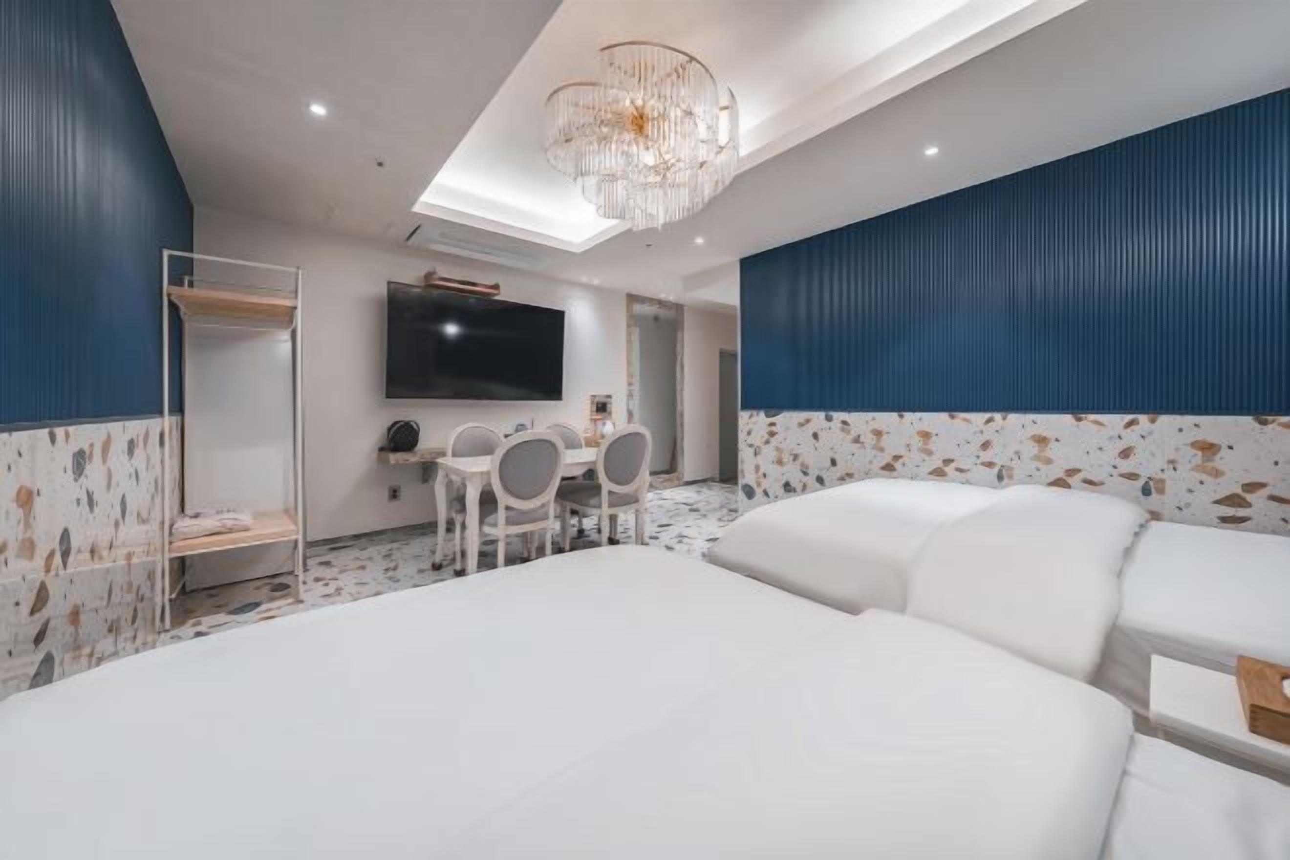 Premium bedding, down duvets, desk, laptop workspace