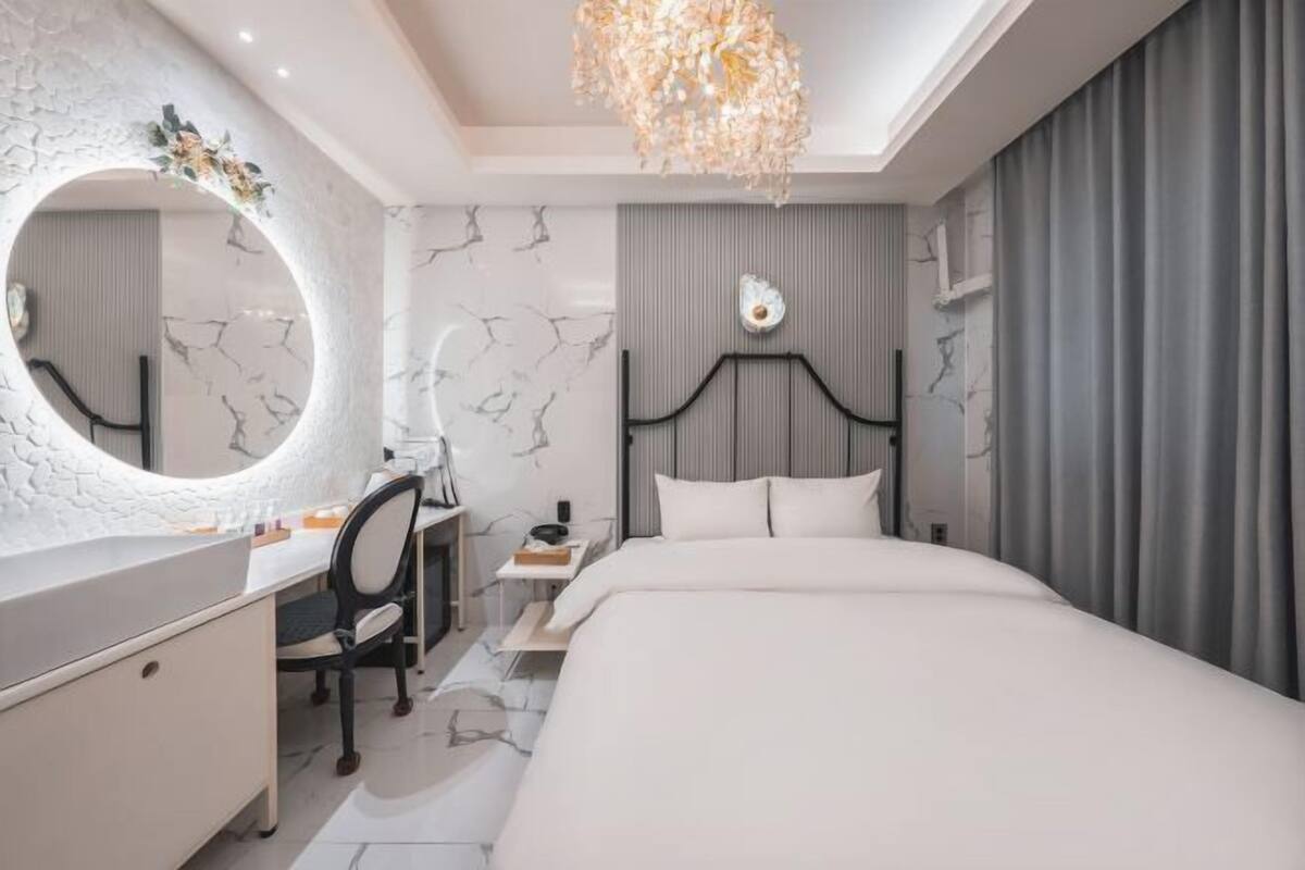 Premium bedding, down comforters, individually decorated