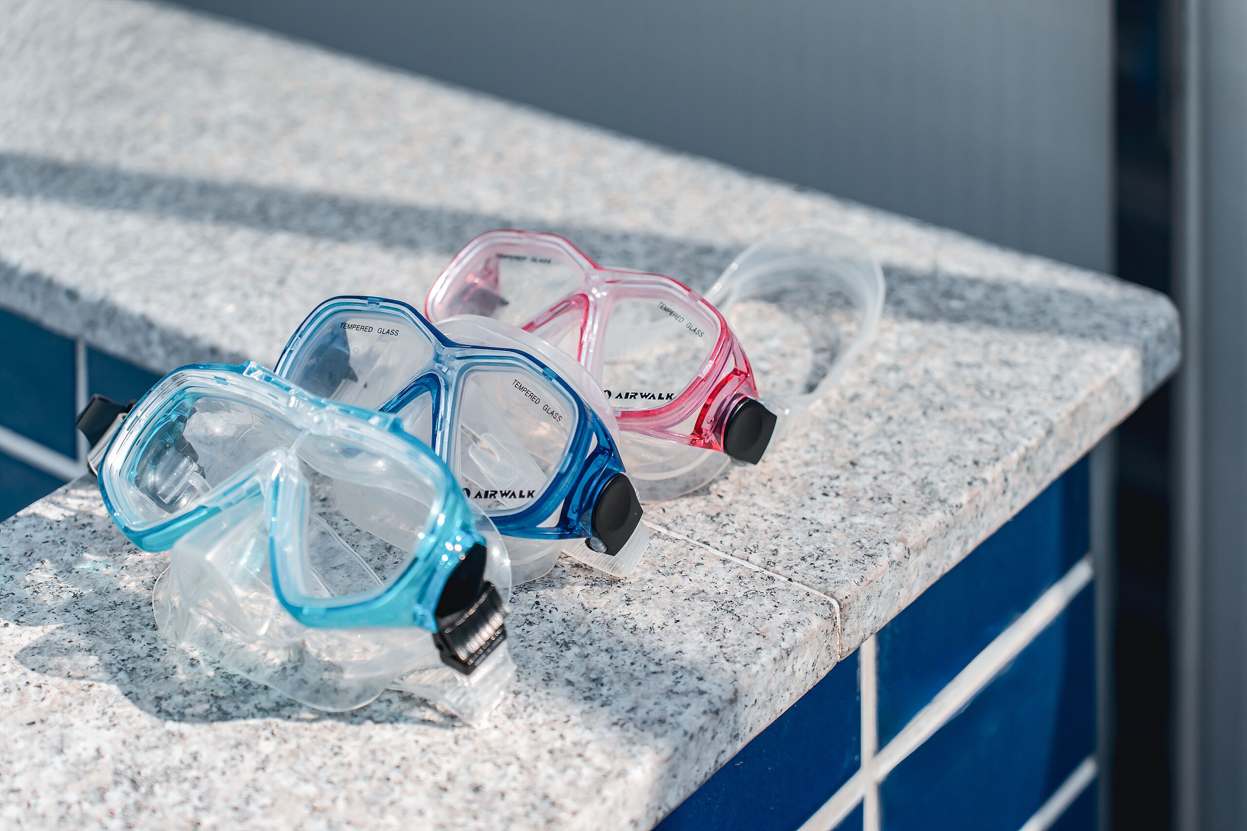 Snorkels on a granite countertop.