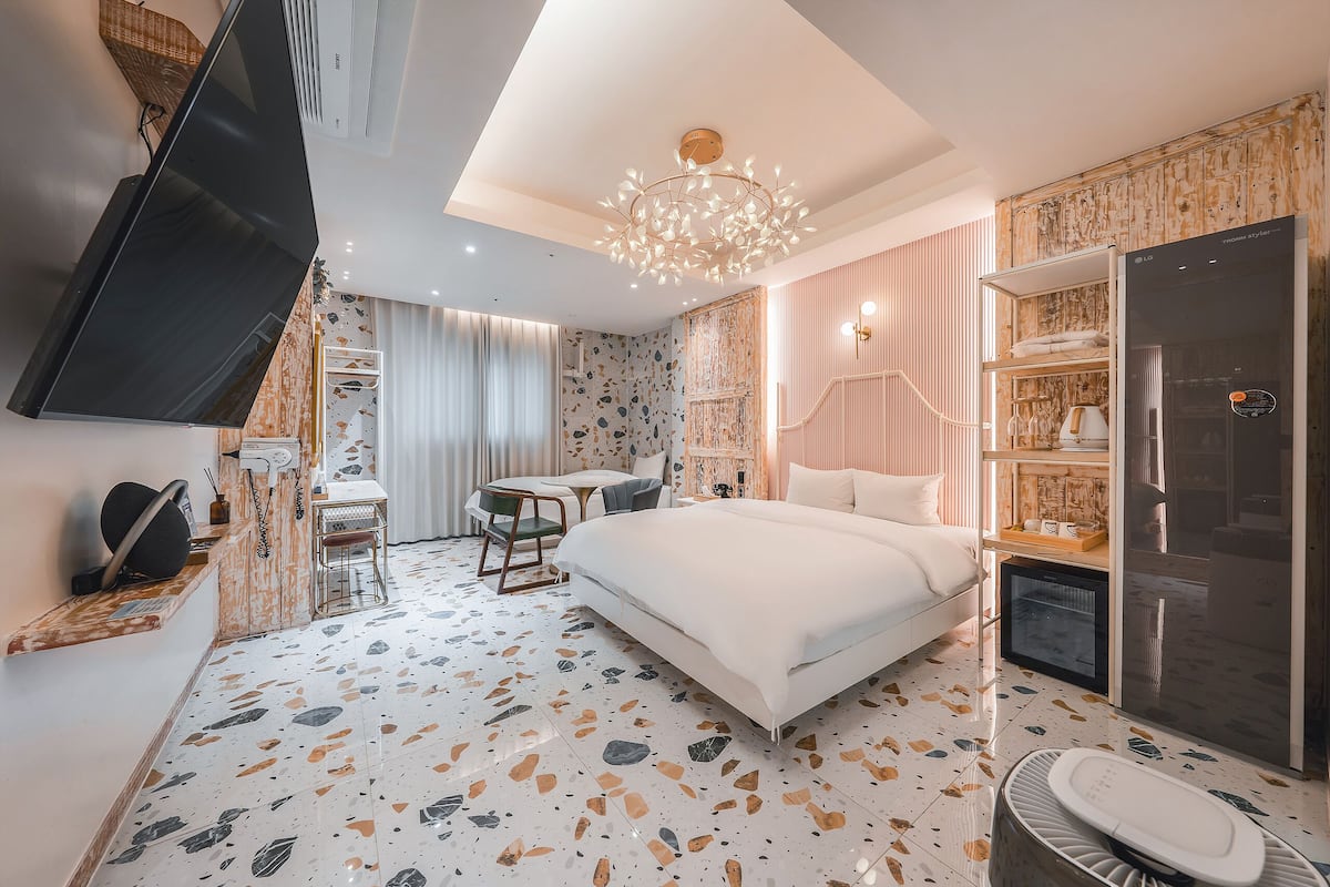 Premium bedding, down duvets, individually decorated