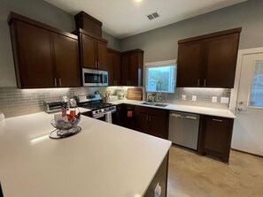 Fridge, microwave, oven, stovetop - Modern Home In North-central Austin (Austin)